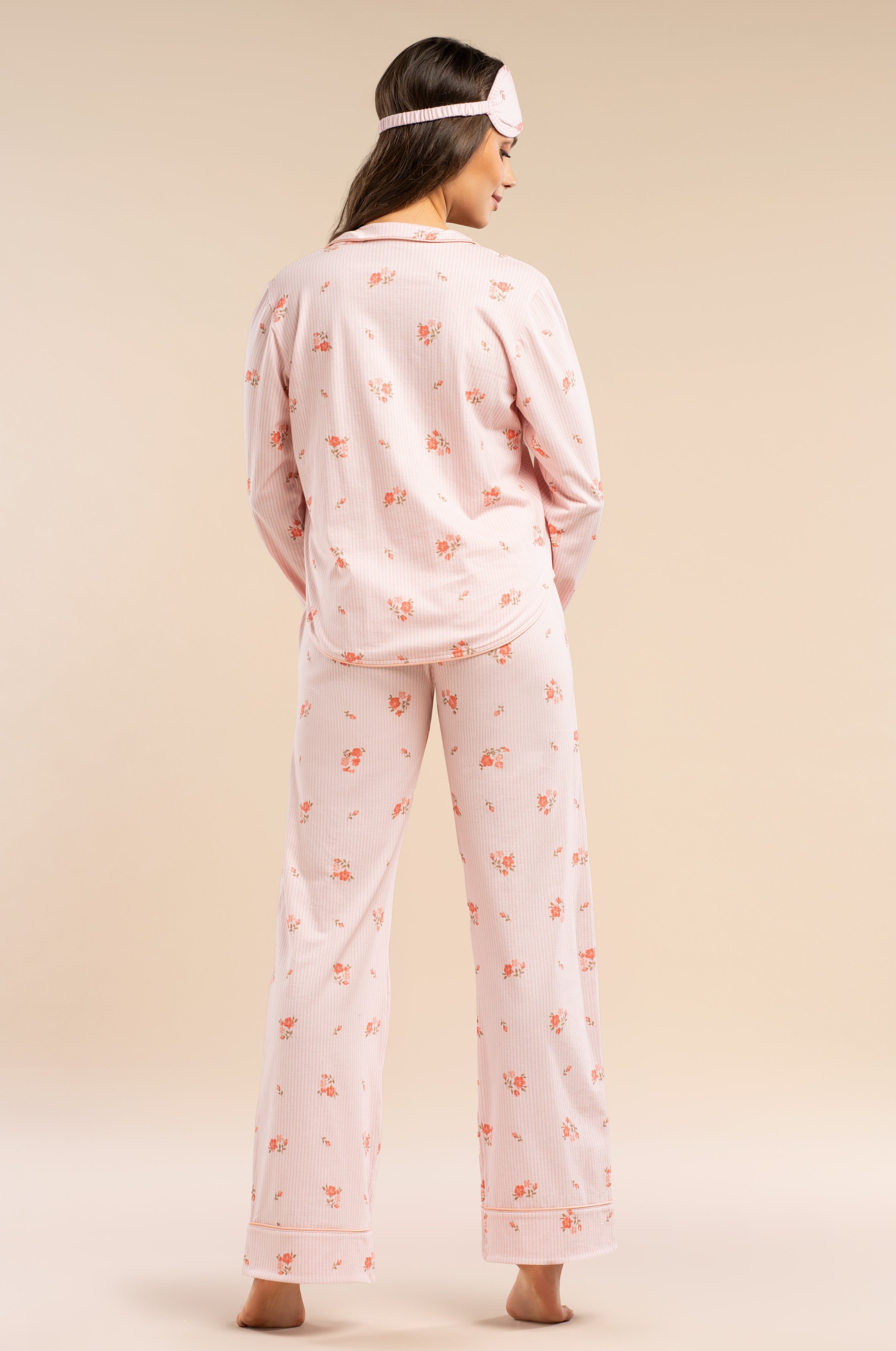 Pyjama in Rosé aus 100 % Baumwolle mit Blütenprint & Paspeln